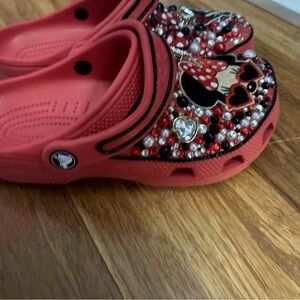 CROCS Red Beaded Clogs with Character Accent